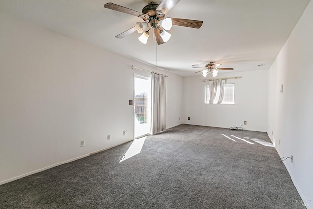 carpeted empty room featuring ceiling fan