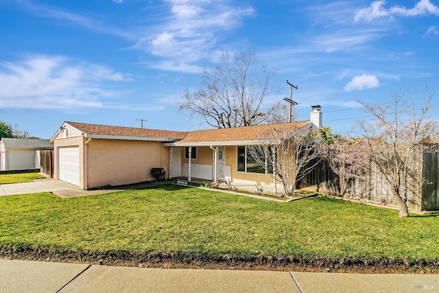 single story home featuring a garage and a front yard