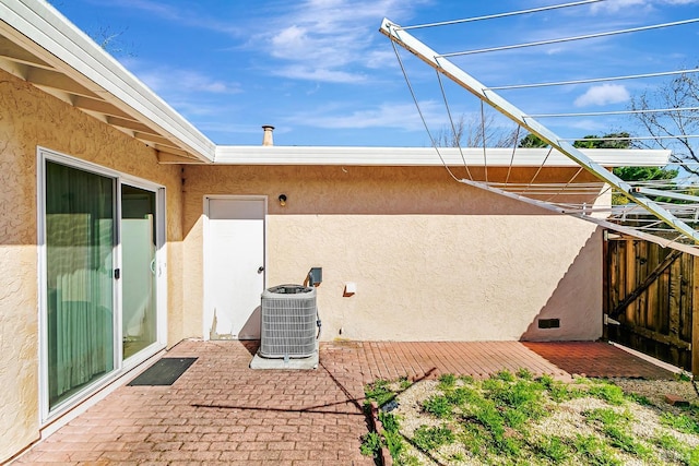 view of patio / terrace with central AC unit