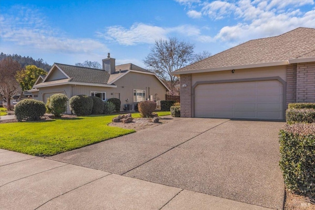 ranch-style home with a garage, a front yard, brick siding, and a shingled roof