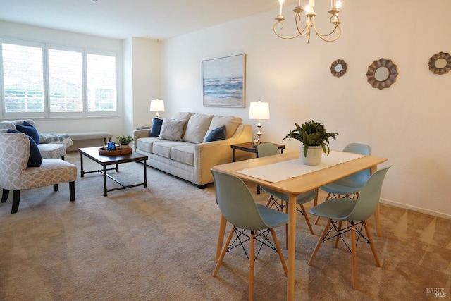 carpeted living room with a notable chandelier