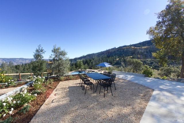 view of patio featuring a mountain view