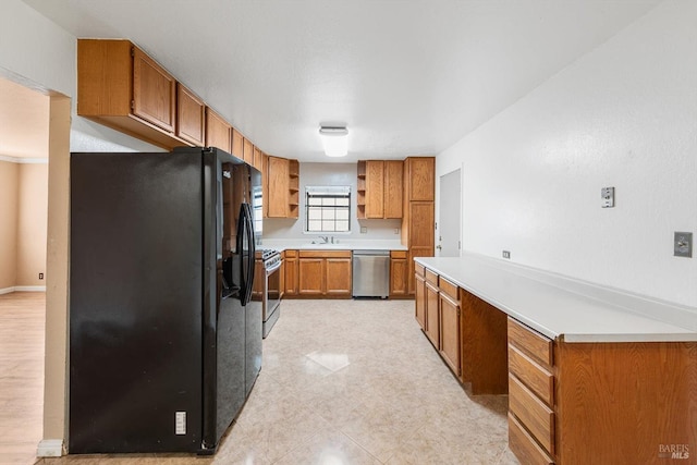 kitchen featuring appliances with stainless steel finishes and sink