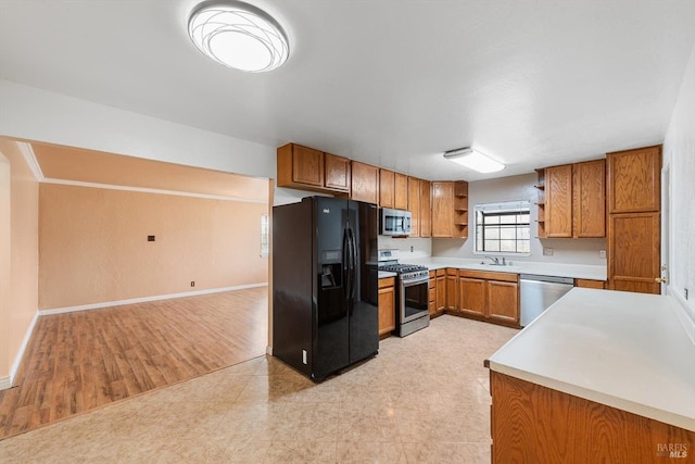 kitchen featuring appliances with stainless steel finishes and sink