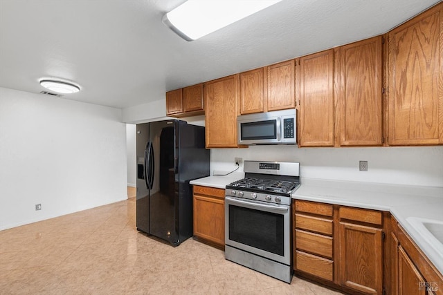 kitchen with stainless steel appliances and sink