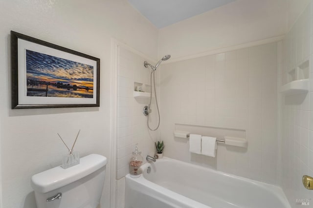 bathroom featuring toilet and shower / bathtub combination