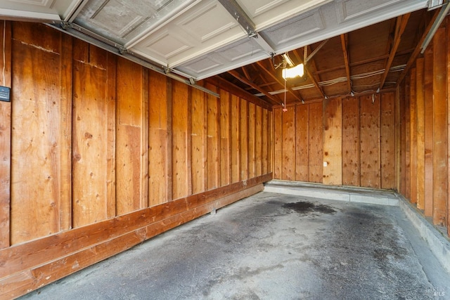 garage with wood walls