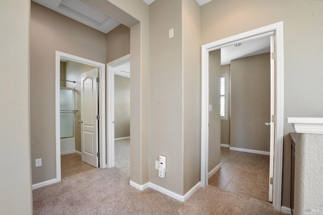 corridor with light carpet