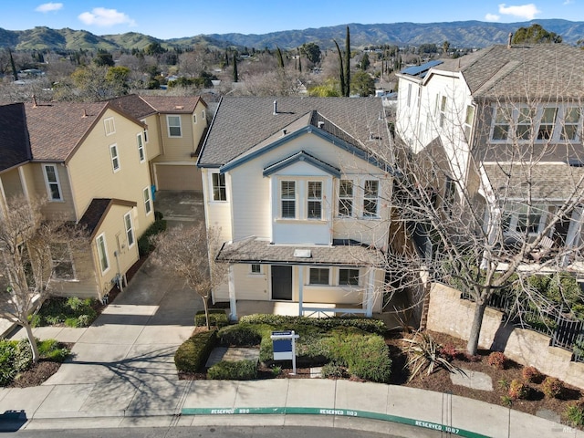 exterior space featuring a mountain view
