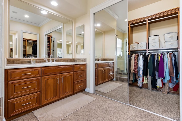 bathroom featuring vanity and crown molding