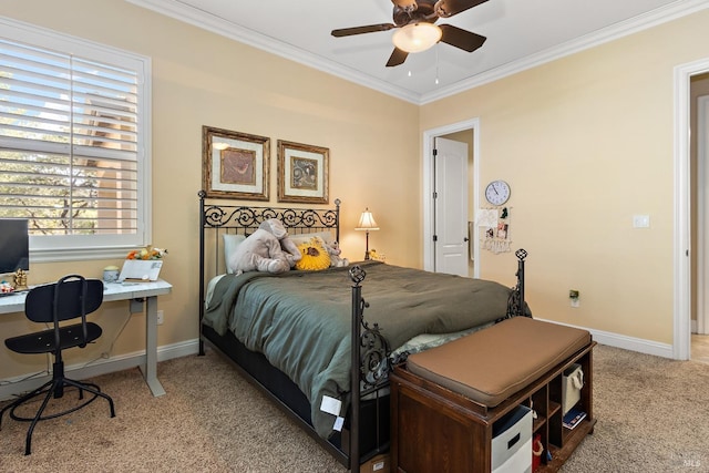 carpeted bedroom with crown molding and ceiling fan