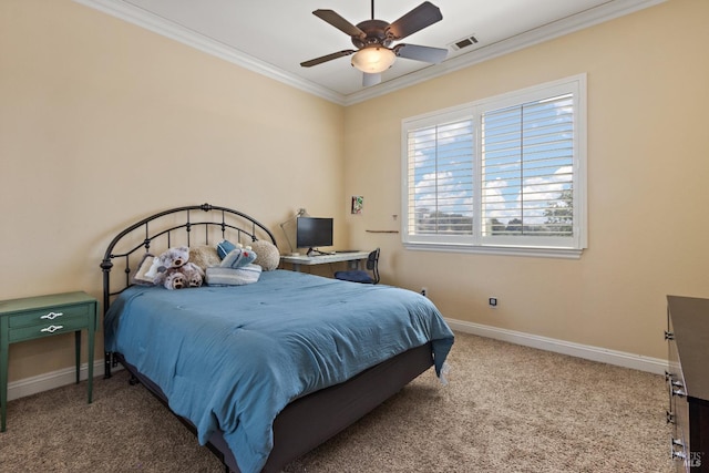 carpeted bedroom featuring crown molding and ceiling fan