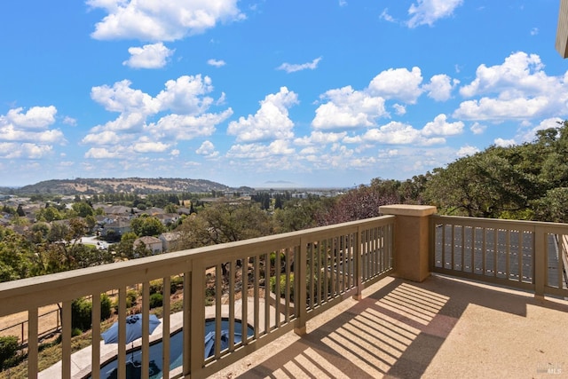 balcony featuring a mountain view