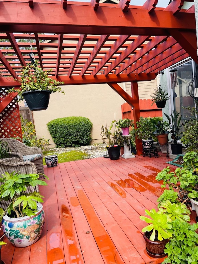 wooden deck with a pergola