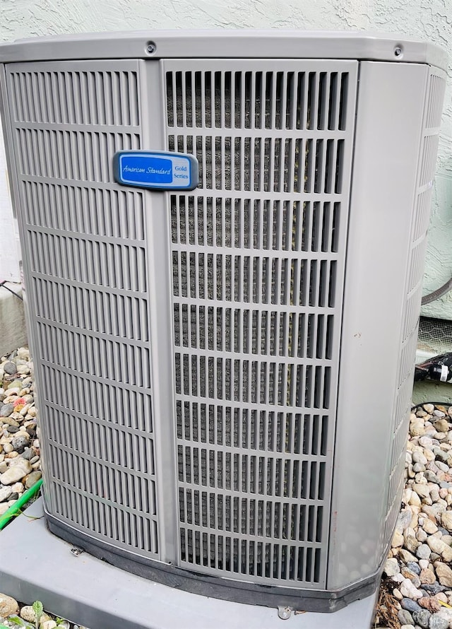 exterior details featuring central AC