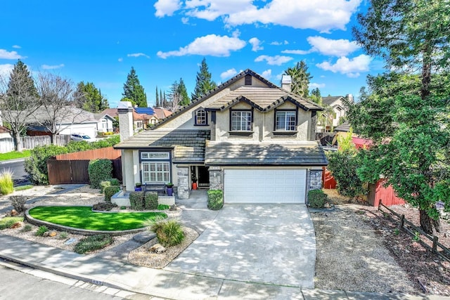 view of front of home with a garage