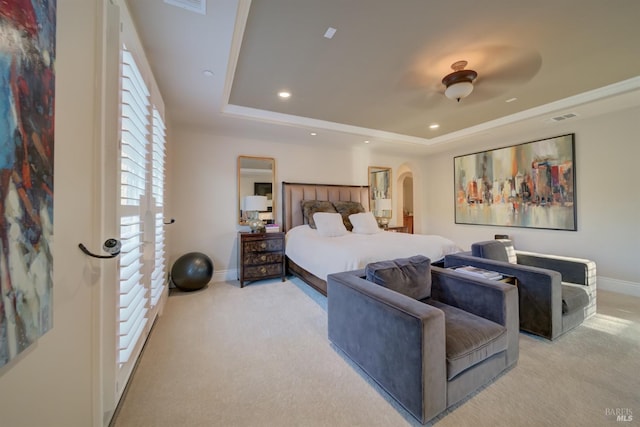 5319 Bayridge Ct, Fairfield, CA 94534 - carpeted bedroom featuring a tray ceiling, arched walkways, baseboards, and recessed lighting