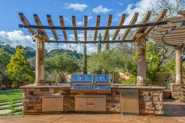 5319 Bayridge Ct, Fairfield, CA 94534 - view of patio / terrace with a pergola, an outdoor kitchen, and area for grilling