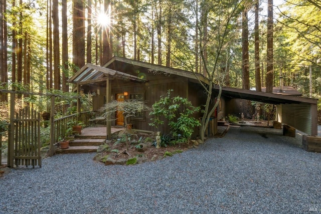 view of front of property with a carport