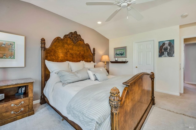 carpeted bedroom featuring vaulted ceiling and ceiling fan