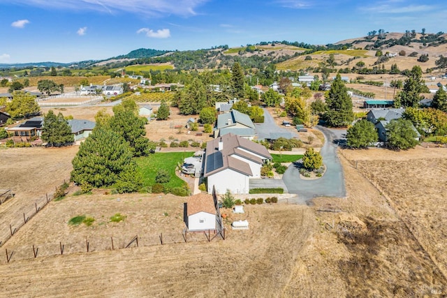 drone / aerial view featuring a mountain view