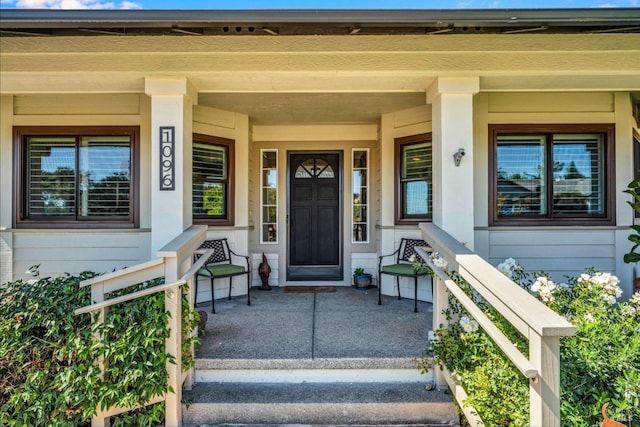 entrance to property with a porch