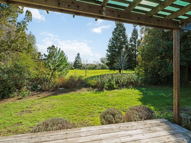 view of yard with a wooden deck