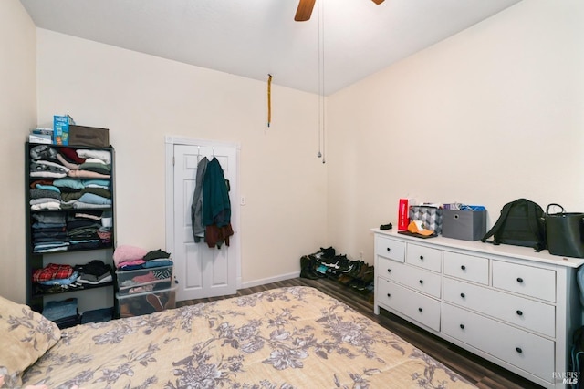 bedroom featuring ceiling fan and dark hardwood / wood-style floors