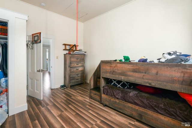 bedroom featuring dark wood-type flooring