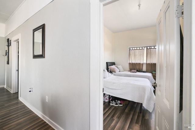 bedroom featuring dark hardwood / wood-style floors