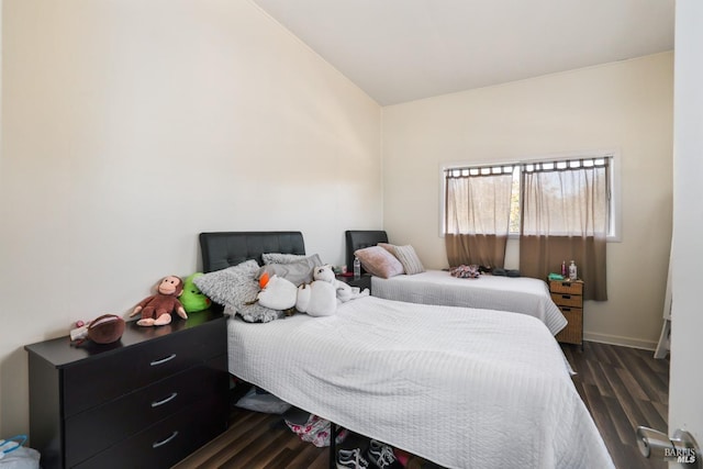 9211 Boyce Rd, Winters, CA 95694 - bedroom with dark wood-style flooring and vaulted ceiling