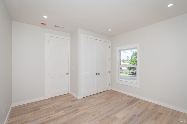 1008 Evans Ave, Napa, CA 94559 - unfurnished bedroom featuring baseboards, light wood-type flooring, visible vents, and recessed lighting