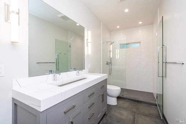 1008 Evans Ave, Napa, CA 94559 - bathroom with a tile shower, toilet, vanity, tile patterned flooring, and recessed lighting