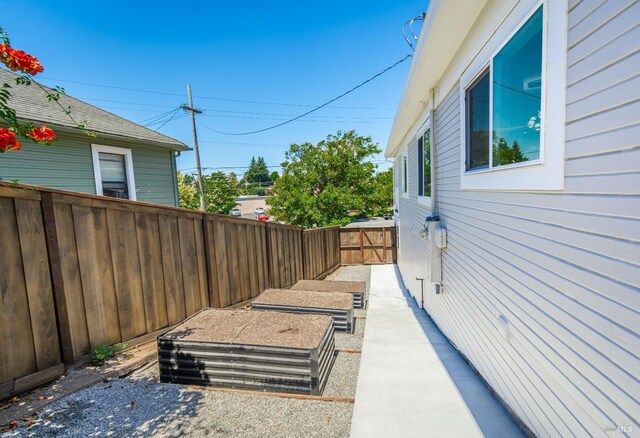 1008 Evans Ave, Napa, CA 94559 - exterior space with fence and a vegetable garden