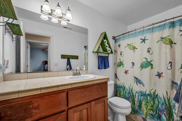 19839 Mountain Mdw S, Hidden Valley Lake, CA 95467 - bathroom featuring a shower with curtain, vanity, and toilet