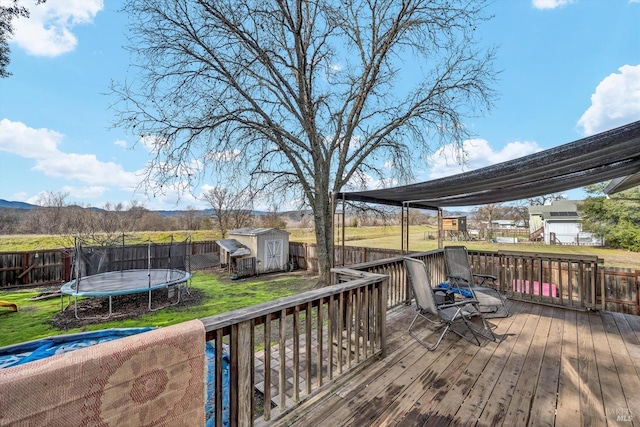 19839 Mountain Mdw S, Hidden Valley Lake, CA 95467 - deck with a storage unit, a trampoline, and a lawn