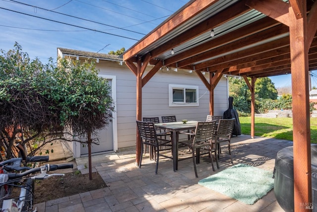 view of patio with outdoor dining area