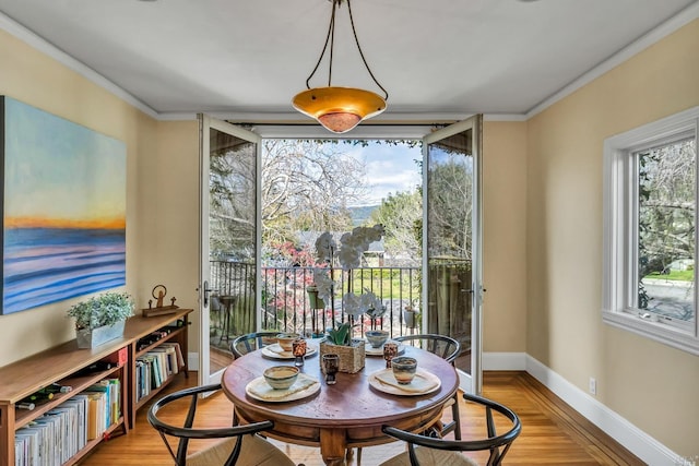 18900 Robinson Rd, Sonoma, CA 95476 - dining space with floor to ceiling windows, crown molding, and light hardwood / wood-style flooring