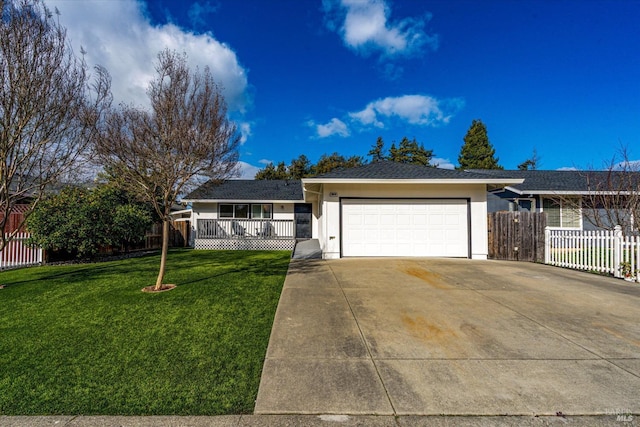 ranch-style home with a front lawn and a garage