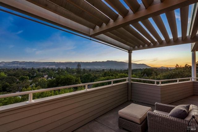 balcony featuring a mountain view