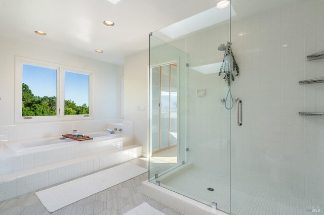 full bathroom with recessed lighting, a garden tub, a shower stall, and tile patterned floors