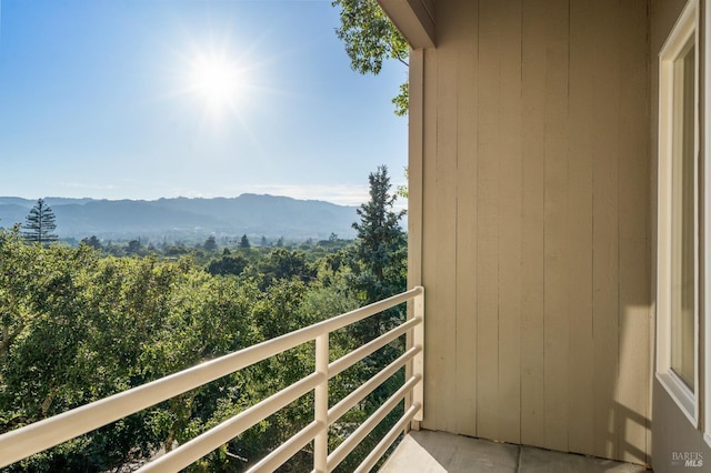 balcony featuring a mountain view