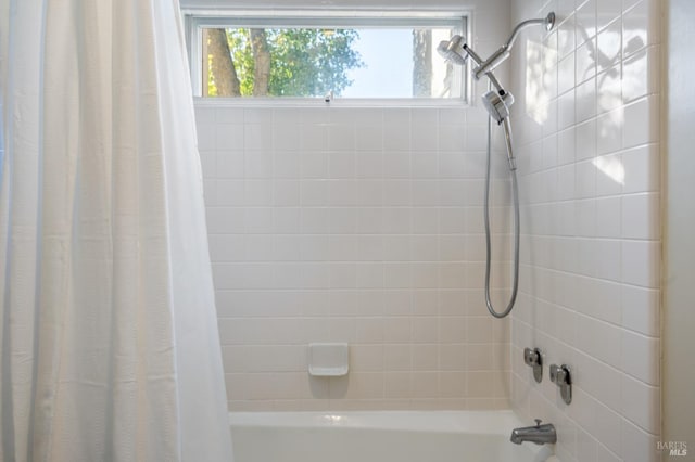 full bath featuring shower / tub combo