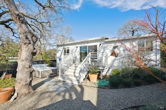 view of front facade featuring a hot tub