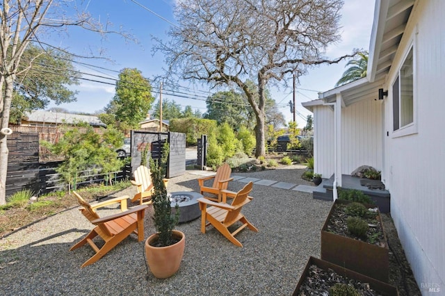 view of patio / terrace featuring a fire pit