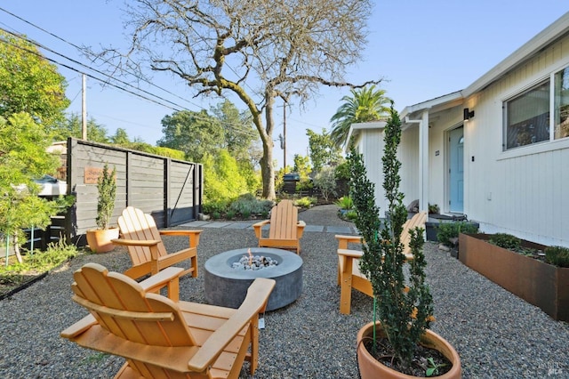 view of patio featuring a fire pit