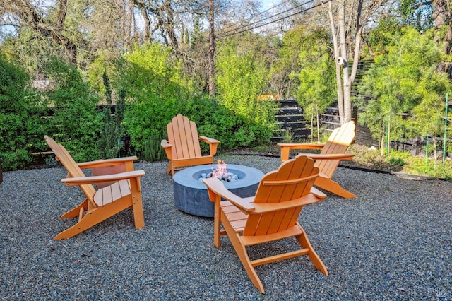 view of patio / terrace with a fire pit