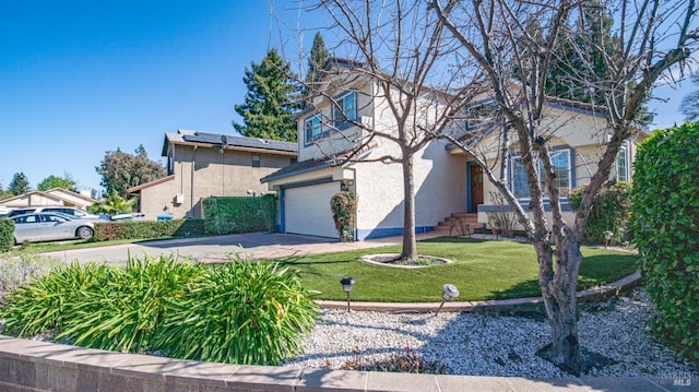 view of front of property featuring driveway, a garage, a front lawn, and stucco siding