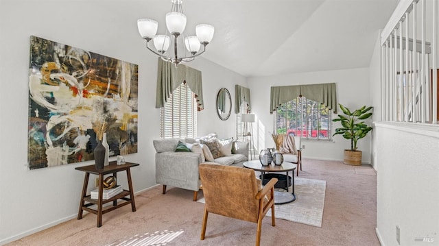 sitting room with a healthy amount of sunlight, an inviting chandelier, carpet, and baseboards