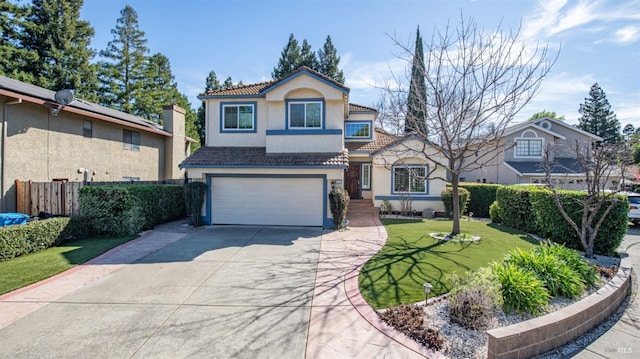 view of front facade featuring stucco siding, concrete driveway, an attached garage, fence, and a tiled roof